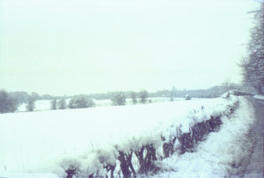 Snow covered fields along lane to Pilgrims Holt